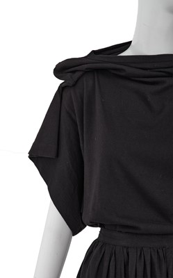 Lot 67 - A Comme des Garçons black cotton ensemble, ‘Patchworks and X’ collection, Spring-Summer 1983