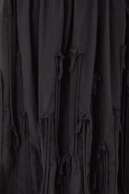 Lot 67 - A Comme des Garçons black cotton ensemble, ‘Patchworks and X’ collection, Spring-Summer 1983