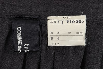 Lot 67 - A Comme des Garçons black cotton ensemble, ‘Patchworks and X’ collection, Spring-Summer 1983