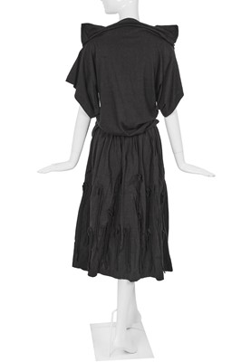 Lot 67 - A Comme des Garçons black cotton ensemble, ‘Patchworks and X’ collection, Spring-Summer 1983