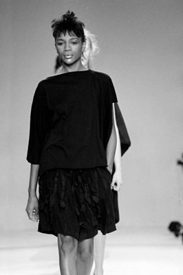Lot 67 - A Comme des Garçons black cotton ensemble, ‘Patchworks and X’ collection, Spring-Summer 1983