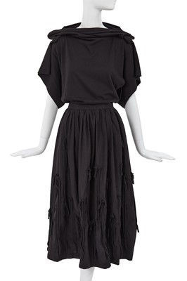 Lot 67 - A Comme des Garçons black cotton ensemble, ‘Patchworks and X’ collection, Spring-Summer 1983