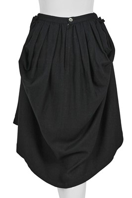 Lot 77 - A Comme des Garçons black wool ensemble, ‘Gloves, Skirts, Quilted Big Coats’ collection, Autumn-Winter 1983-84 s)’ collection, Autumn-Winter 1984-85