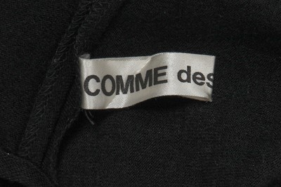 Lot 77 - A Comme des Garçons black wool ensemble, ‘Gloves, Skirts, Quilted Big Coats’ collection, Autumn-Winter 1983-84 s)’ collection, Autumn-Winter 1984-85