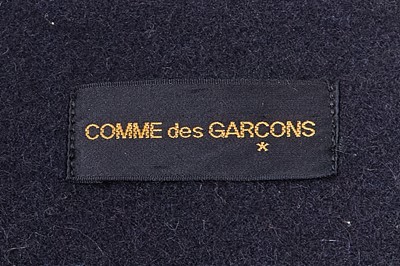 Lot 82 - A Comme des Garçons ink blue wool coat, probably ‘Gloves, Skirts, Quilted Big Coats’ collection, Autumn-Winter 1983-84