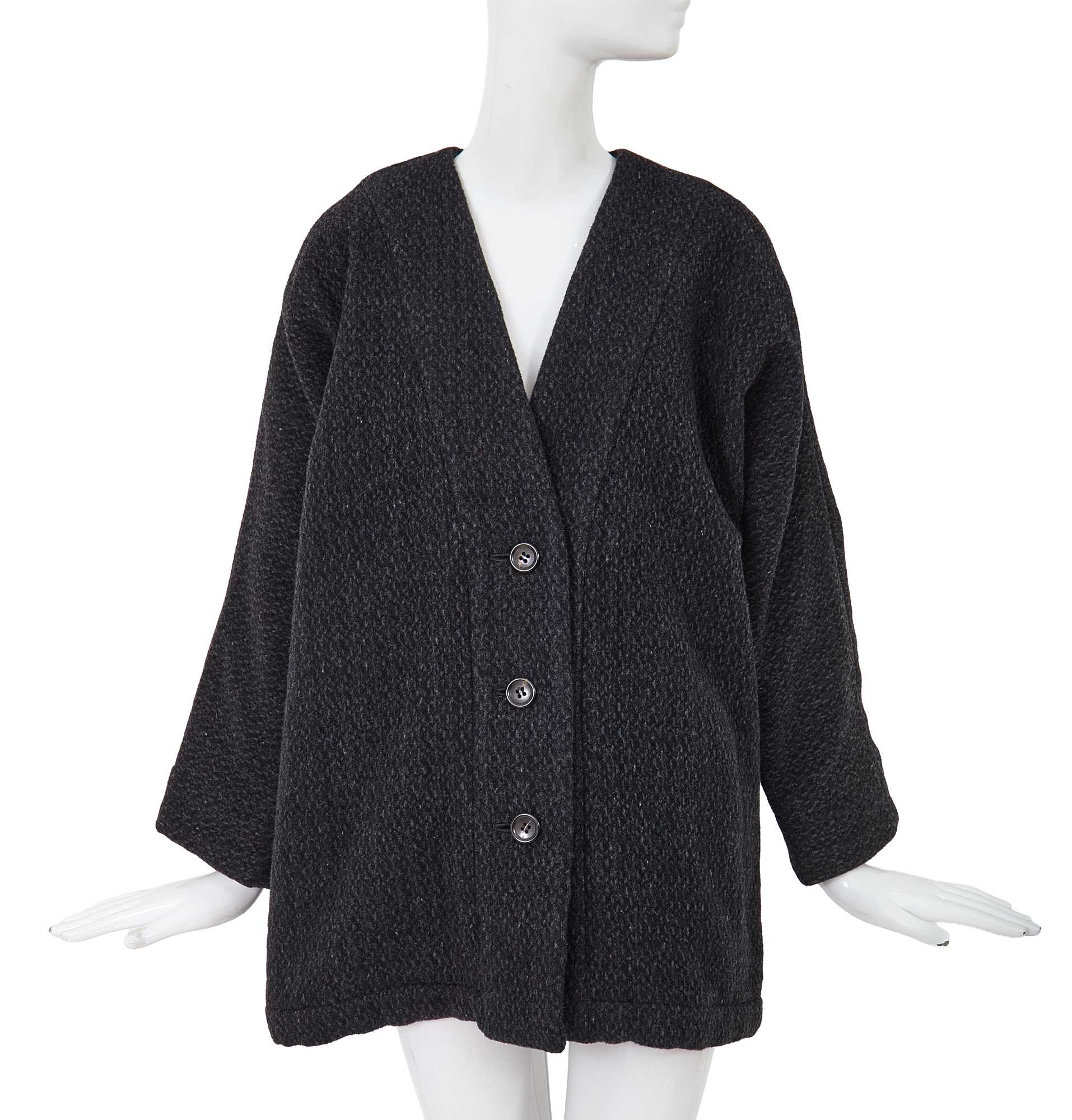 Lot 65 - A Comme des Garçons speckled grey wool jacket, ‘Holes’ collection, Autumn-Winter 1982-83