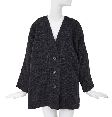 Lot 65 - A Comme des Garçons speckled grey wool jacket, ‘Holes’ collection, Autumn-Winter 1982-83