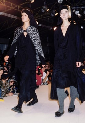 Lot 78 - A Comme des Garçons black wool ensemble, ‘Gloves, Skirts, Quilted Big Coats’ collection, Autumn-Winter 1983-84