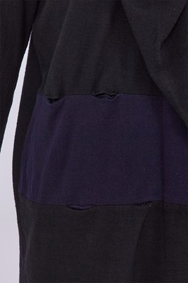 Lot 78 - A Comme des Garçons black wool ensemble, ‘Gloves, Skirts, Quilted Big Coats’ collection, Autumn-Winter 1983-84
