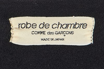 Lot 78 - A Comme des Garçons black wool ensemble, ‘Gloves, Skirts, Quilted Big Coats’ collection, Autumn-Winter 1983-84