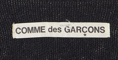 Lot 91 - A Comme des Garçons black knitted wool vareuse sweater, circa 1984