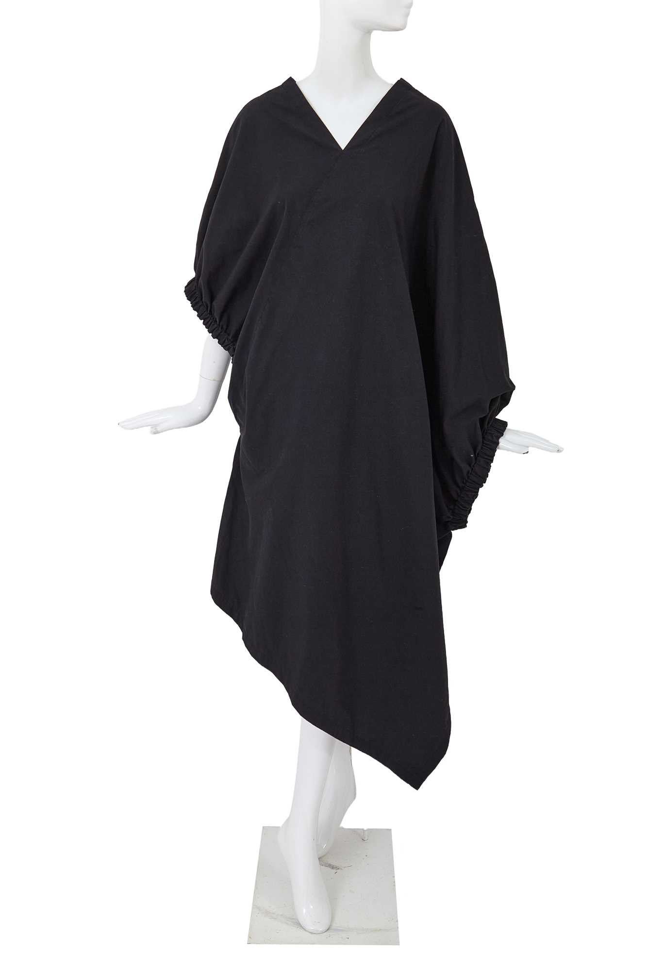 Lot 86 - A Comme des Garçons black cotton robe, ‘Round Rubber’ collection, Spring-Summer 1984