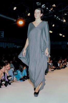 Lot 86 - A Comme des Garçons black cotton robe, ‘Round Rubber’ collection, Spring-Summer 1984