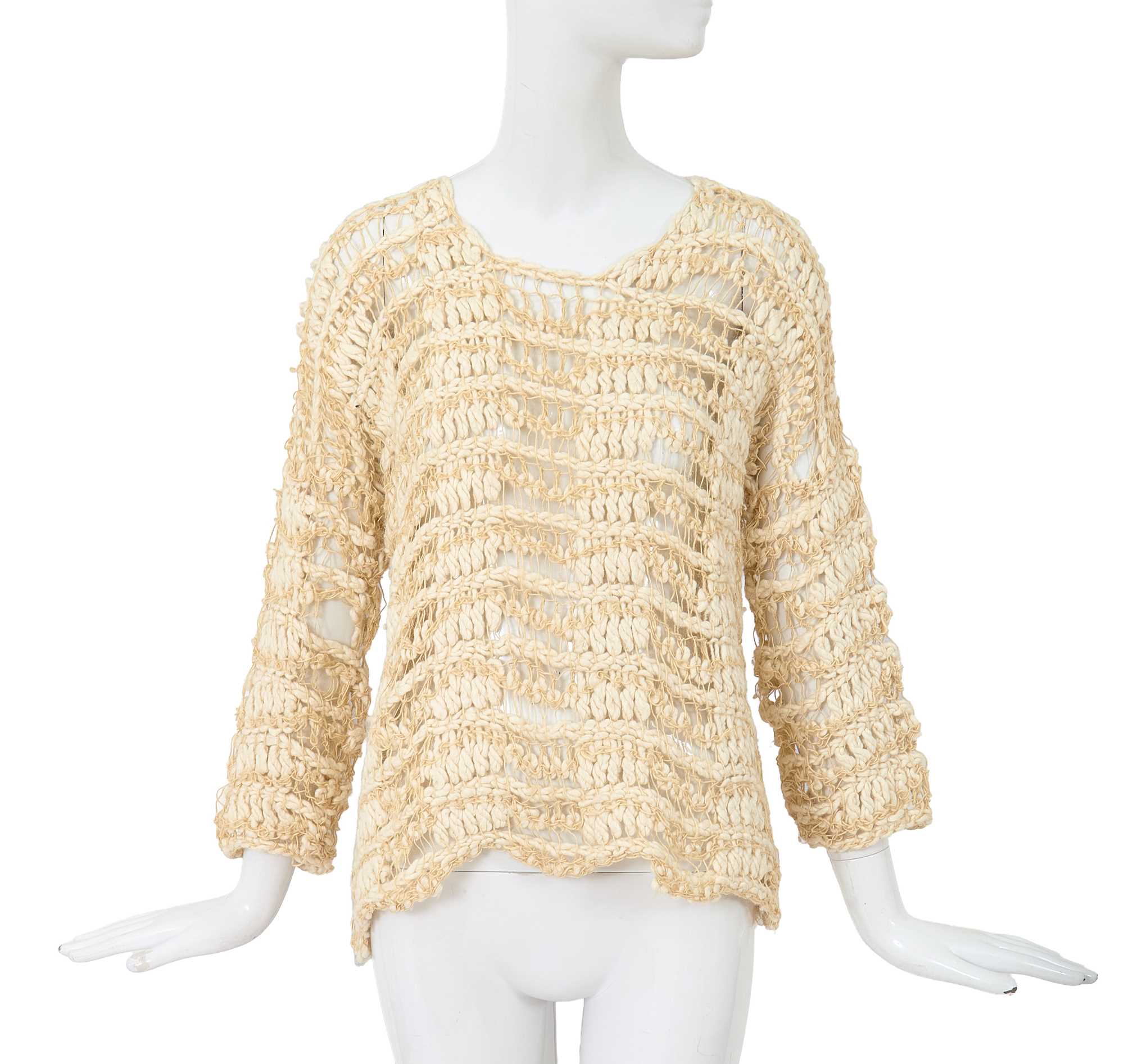 Lot 92 - A Comme des Garçons beige cotton and wool open-knit sweater, circa 1984