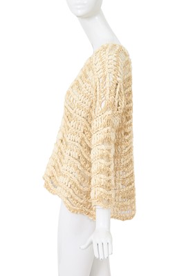 Lot 92 - A Comme des Garçons beige cotton and wool open-knit sweater, circa 1984