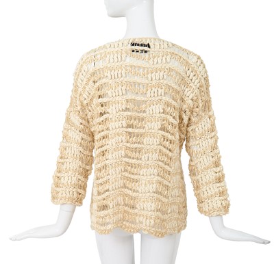 Lot 92 - A Comme des Garçons beige cotton and wool open-knit sweater, circa 1984