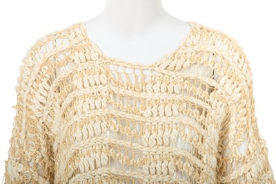 Lot 92 - A Comme des Garçons beige cotton and wool open-knit sweater, circa 1984