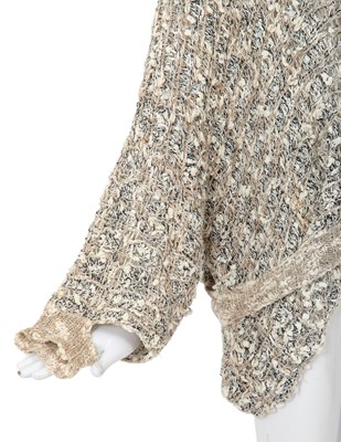 Lot 70 - A Comme des Garçons distressed beige cotton-hemp blend knitted sweater, probably ‘Patchworks and X’ collection, Spring-Summer 1983