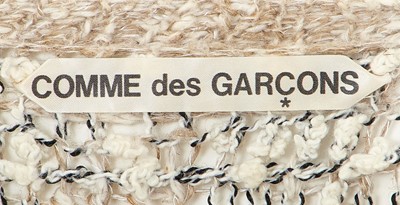 Lot 70 - A Comme des Garçons distressed beige cotton-hemp blend knitted sweater, probably ‘Patchworks and X’ collection, Spring-Summer 1983
