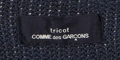 Lot 88 - A Comme des Garçons navy and white knitted cotton vareuse sweater probably ‘Round Rubber’ collection, Spring-Summer 1984