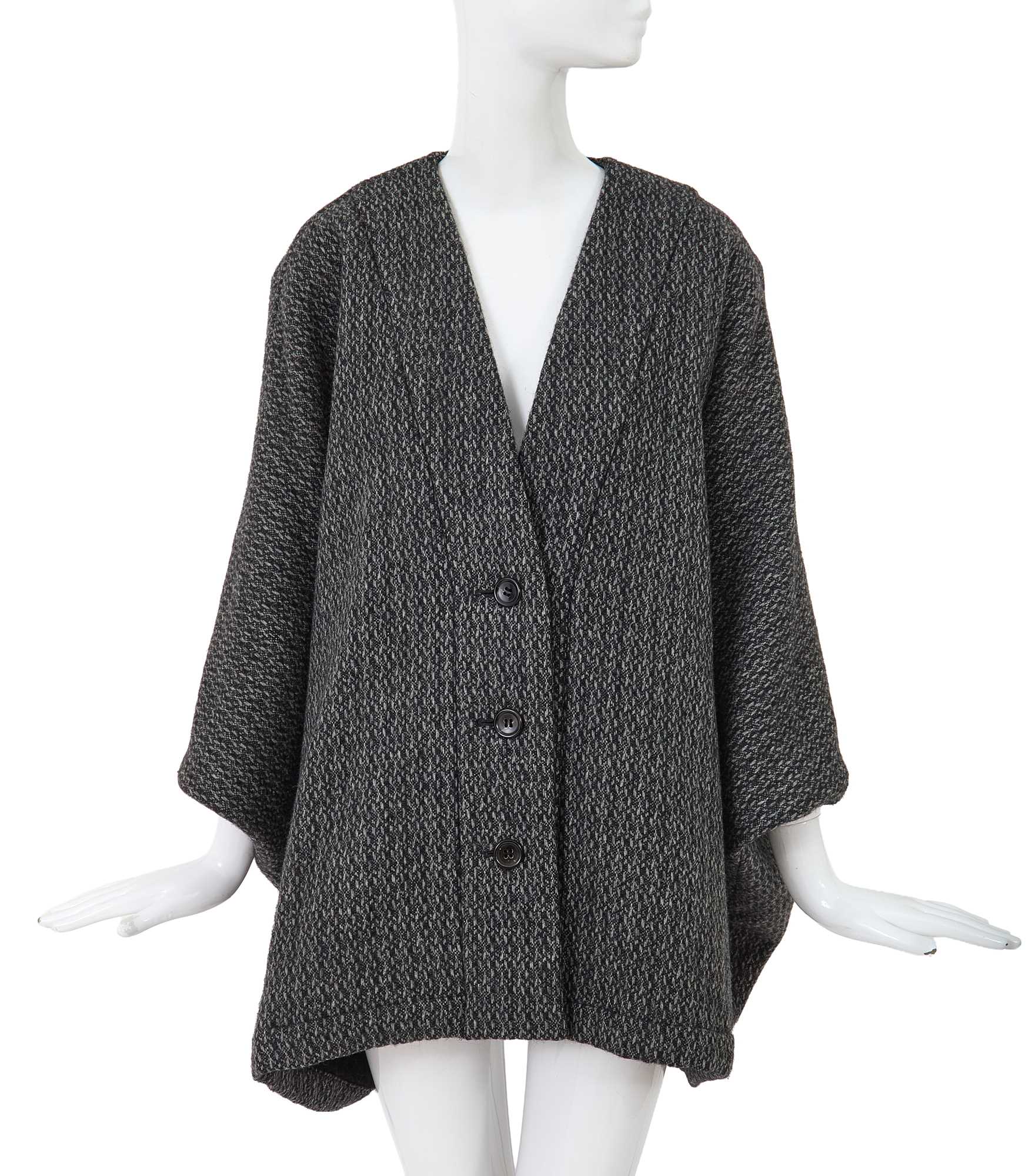 Lot 63 - A Comme des Garçons grey speckled wool jacket, ‘Holes’ collection, Autumn-Winter 1982-83