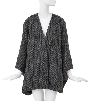 Lot 63 - A Comme des Garçons grey speckled wool jacket, ‘Holes’ collection, Autumn-Winter 1982-83