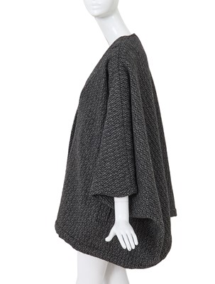 Lot 63 - A Comme des Garçons grey speckled wool jacket, ‘Holes’ collection, Autumn-Winter 1982-83