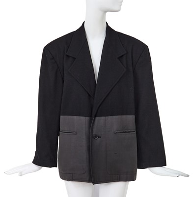 Lot 93 - A Comme des Garçons black wool and cotton blazer, probably ‘Twist, Silk + Jersey, Knits (Patchworks)’ collection, Autumn-Winter 1984-85