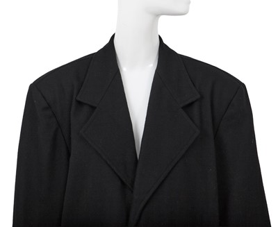 Lot 93 - A Comme des Garçons black wool and cotton blazer, probably ‘Twist, Silk + Jersey, Knits (Patchworks)’ collection, Autumn-Winter 1984-85