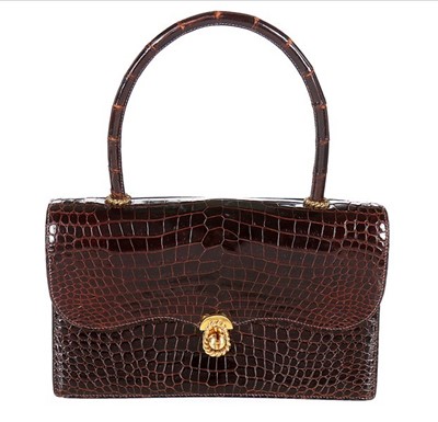 Lot 27 - An Hermès chocolate brown crocodile handbag,...