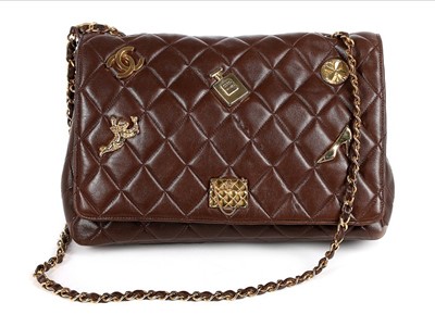 Lot 34 - A Chanel quilted brown leather shoulder bag,...