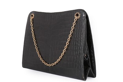 Lot 30 - A Cartier black crocodile handbag with 9ct...