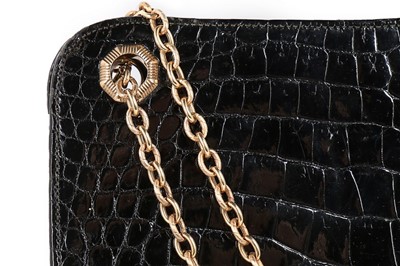 Lot 30 - A Cartier black crocodile handbag with 9ct...