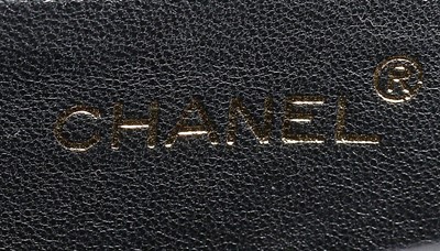 Lot 29 - A Chanel emerald green quilted lizard-skin bag,...