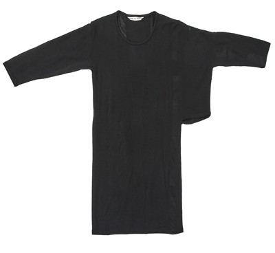 Lot 60 - An important Comme des Garçons distressed black wool dress, probably ‘Holes’ collection, Autumn-Winter 1982-83