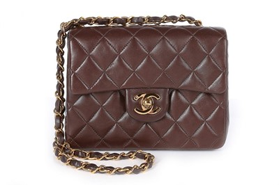 Lot 24 - A Chanel quilted brown leather bag, 1990s,...