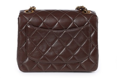 Lot 24 - A Chanel quilted brown leather bag, 1990s,...