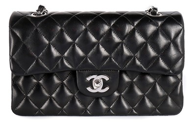 Lot 2 - A Chanel black quilted leather 2.55 bag, 1990s,...