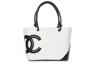Lot 1 - A Chanel quilted white leather shopper, 1990s,...