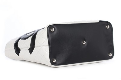 Lot 1 - A Chanel quilted white leather shopper, 1990s,...