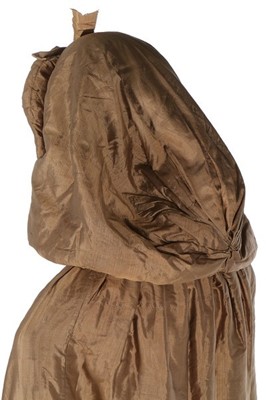 Lot 133 - A rare brown silk padded and hooded cape, late...