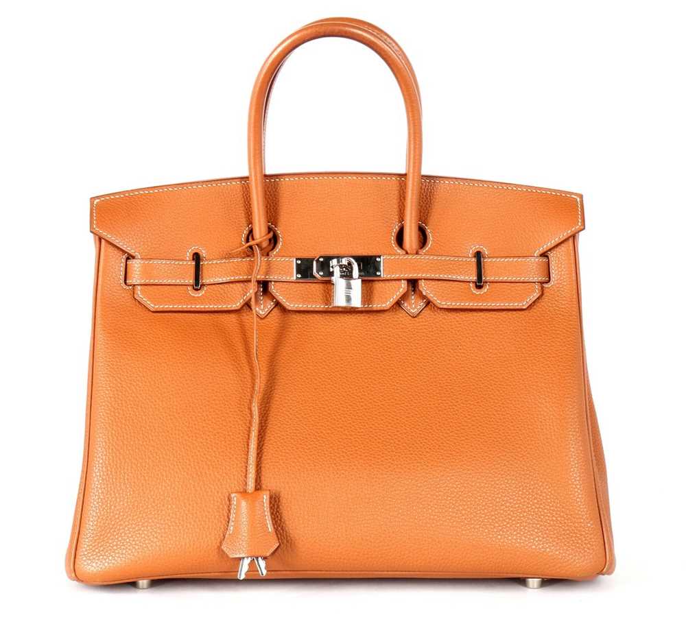 Lot 6 - An Hermès tan togo leather Birkin, 2002, blind...