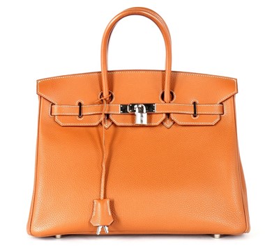 Lot 6 - An Hermès tan togo leather Birkin, 2002, blind...