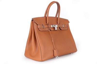Lot 6 - An Hermès tan togo leather Birkin, 2002, blind...