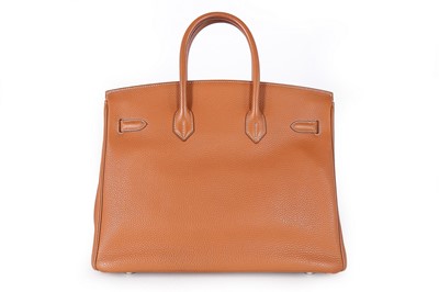 Lot 6 - An Hermès tan togo leather Birkin, 2002, blind...