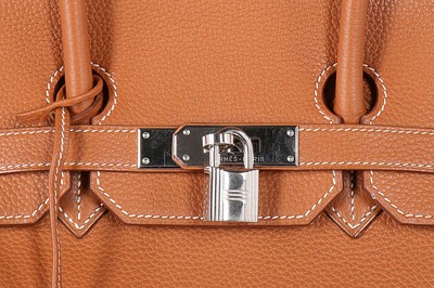 Lot 6 - An Hermès tan togo leather Birkin, 2002, blind...