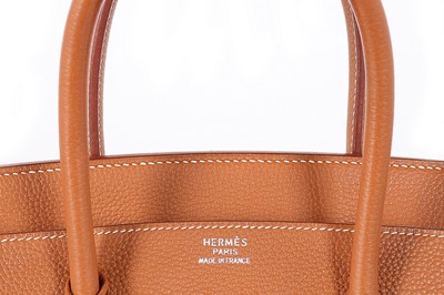 Lot 6 - An Hermès tan togo leather Birkin, 2002, blind...