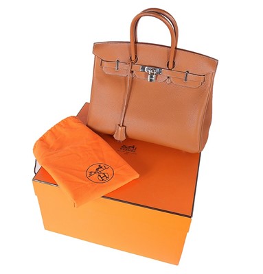 Lot 6 - An Hermès tan togo leather Birkin, 2002, blind...