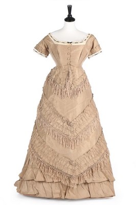 Lot 142 - A taupe taffeta gown with day and evening...