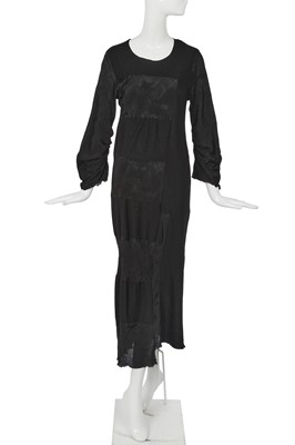 Lot 143 - A Comme des Garçons black patchwork dress, ‘Synergy’ collection, Autumn-Winter 1993-94